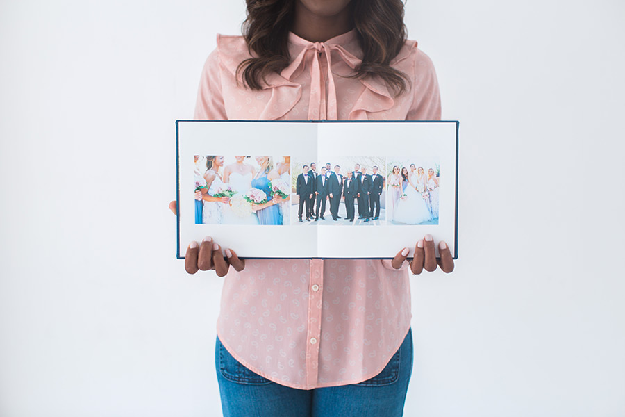 family looking at wedding album